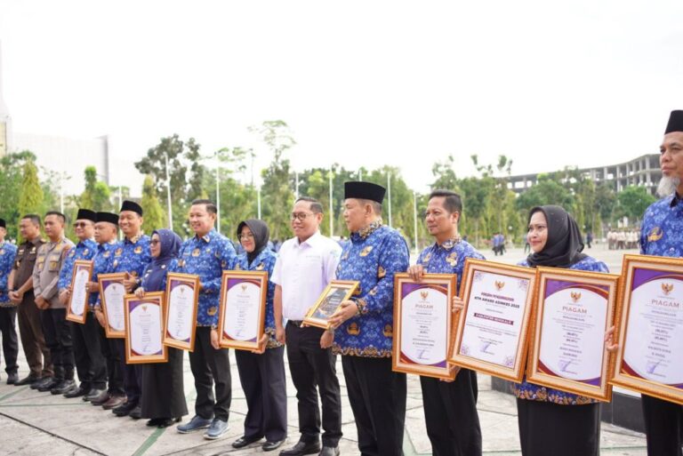 penghargaan-uhc-2025-pemprov-riau